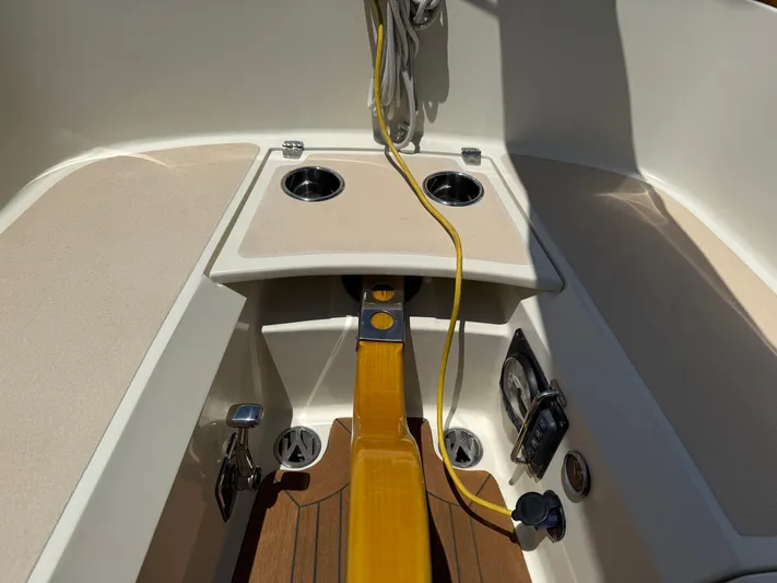 Bolero Yacht Photos Pics Cockpit of 2012 Morris M29 sailboat with control panel and cup holders.