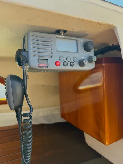 Bolero Yacht Photos Pics Boat radio equipment inside a 2012 Morris M29, featuring a mounted communication device.