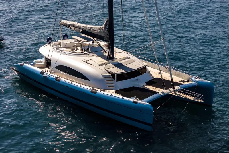 Lyfe At Sea Yacht Photos Pics Luxury 2015 Magic Yachts Custom catamaran sailing on open sea.