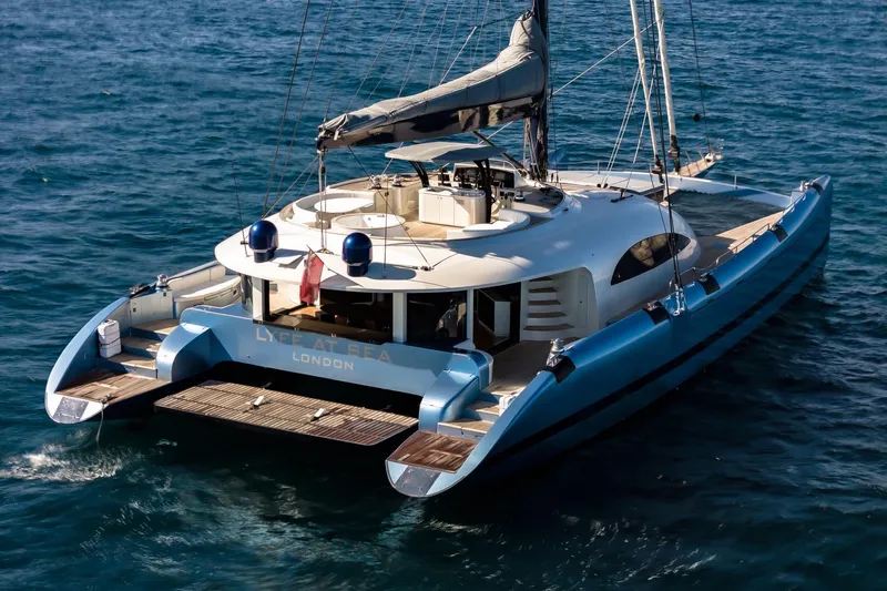 Lyfe At Sea Yacht Photos Pics Luxury Magic Yachts Custom 2015 catamaran sailing on open sea.