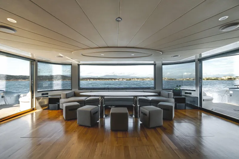 Lyfe At Sea Yacht Photos Pics Luxurious 2015 Magic Yachts Custom interior with panoramic ocean views and elegant seating.