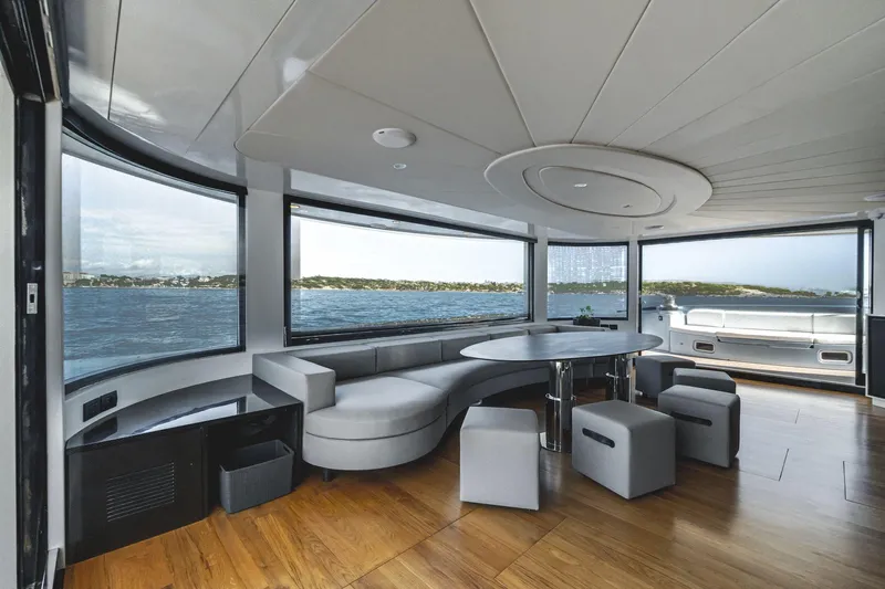 Lyfe At Sea Yacht Photos Pics Luxurious 2015 Magic Yachts Custom interior with panoramic ocean views and modern seating.
