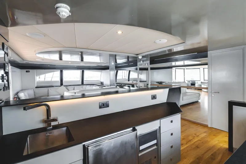 Lyfe At Sea Yacht Photos Pics Luxurious 2015 Magic Yachts Custom interior with modern kitchen and sleek design.