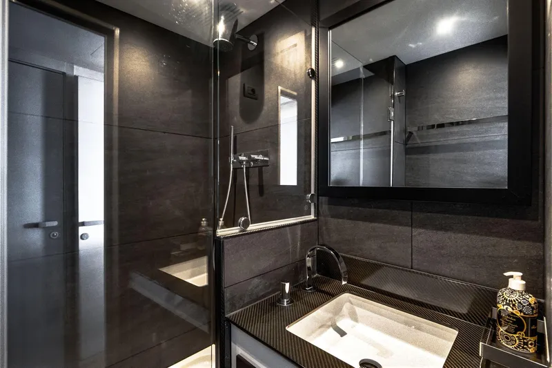 Lyfe At Sea Yacht Photos Pics Luxurious yacht bathroom with modern fixtures, sleek design, and elegant finishes. Magic Yachts Custom 2015.