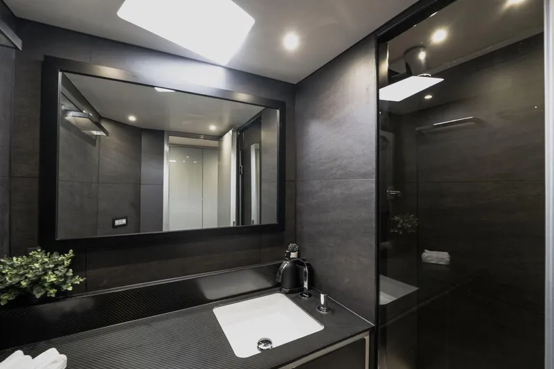 Lyfe At Sea Yacht Photos Pics Luxurious yacht bathroom with modern design, featuring sleek fixtures and ambient lighting, Magic Yachts 2015.