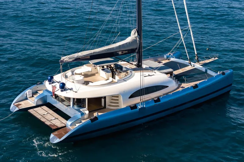 Lyfe At Sea Yacht Photos Pics Luxurious 2015 Magic Yachts Custom catamaran sailing on open sea.