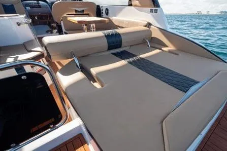 Ready For Delivery! Yacht Photos Pics Luxurious Hanover 305 boat interior, 2026 model, featuring premium seating and ocean view.
