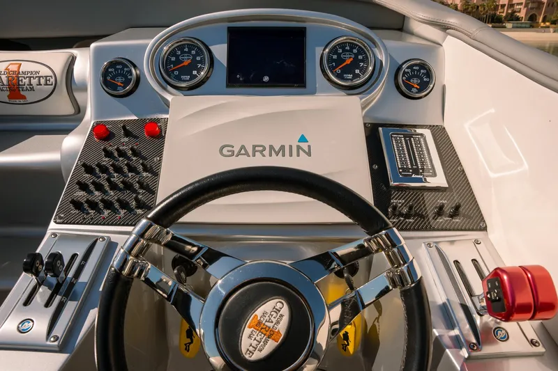  Yacht Photos Pics 2017 Cigarette 50 Marauder boat dashboard with Garmin navigation system.