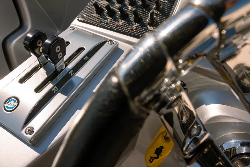  Yacht Photos Pics Close-up of 2017 Cigarette 50 Marauder boat controls and steering wheel.