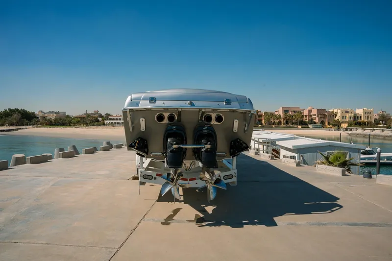  Yacht Photos Pics 2017 Cigarette 50 Marauder boat on a concrete dock.
