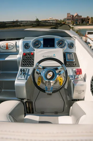  Yacht Photos Pics 2017 Cigarette 50 Marauder boat cockpit with Garmin navigation system.