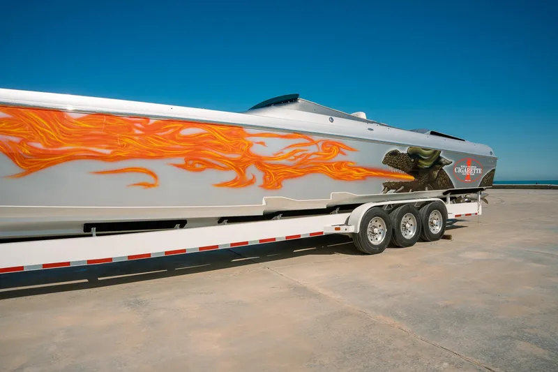  Yacht Photos Pics 2017 Cigarette 50 Marauder boat with flame graphics on trailer.