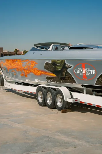  Yacht Photos Pics 2017 Cigarette 50 Marauder speedboat with custom graphics on trailer.