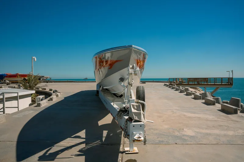  Yacht Photos Pics 2017 Cigarette 50 Marauder boat on trailer at a sunny dock.