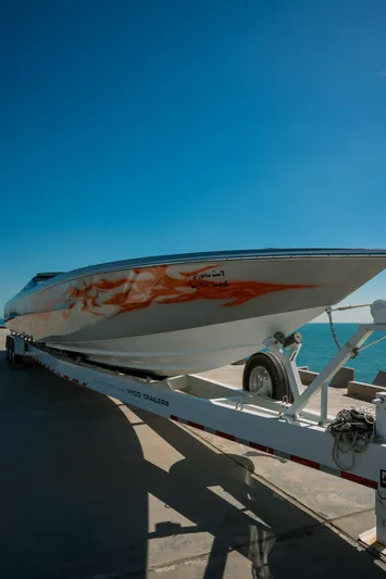  Yacht Photos Pics 2017 Cigarette 50 Marauder speedboat on trailer by the water.