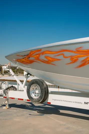  Yacht Photos Pics 2017 Cigarette 50 Marauder boat with flame decals on trailer.