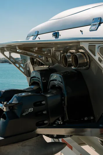  Yacht Photos Pics 2017 Cigarette 50 Marauder boat with powerful engines docked by the water.