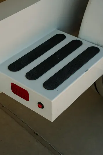  Yacht Photos Pics Close-up of a 2017 Cigarette 50 Marauder boat step with non-slip strips.