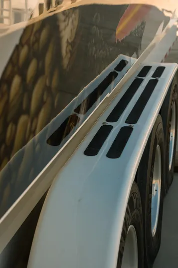  Yacht Photos Pics 2017 Cigarette 50 Marauder boat on trailer, close-up side view.