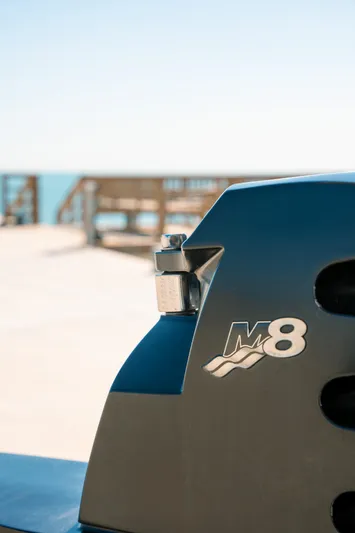  Yacht Photos Pics Close-up of 2017 Cigarette 50 Marauder M8 engine detail by the sea.