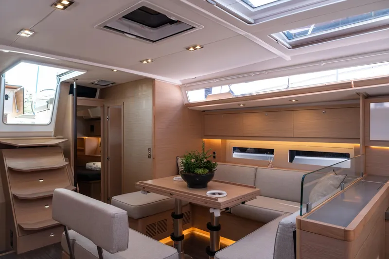  Yacht Photos Pics Luxurious interior of 2024 Dufour 530 yacht with modern design and natural lighting.