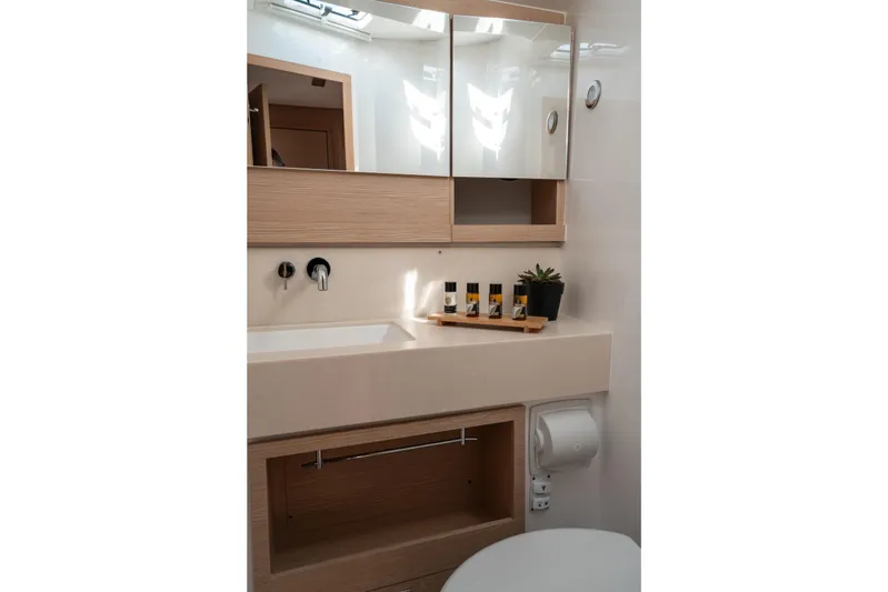  Yacht Photos Pics Modern bathroom interior of 2024 Dufour 530 yacht with sleek design and amenities.