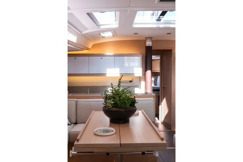 Yacht Photos Pics Luxurious interior of 2024 Dufour 530 yacht with modern design and natural lighting.