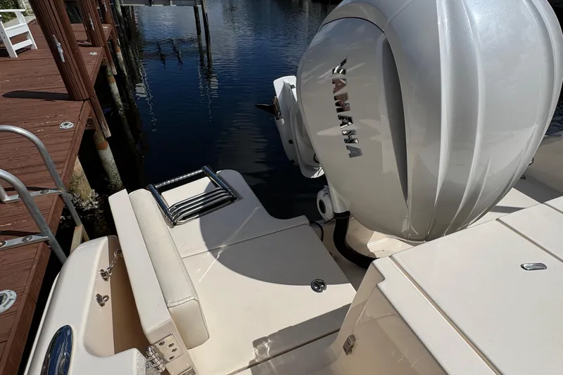  Yacht Photos Pics 2024 Grady-White Fisherman 236 boat with Yamaha outboard engine at dock.