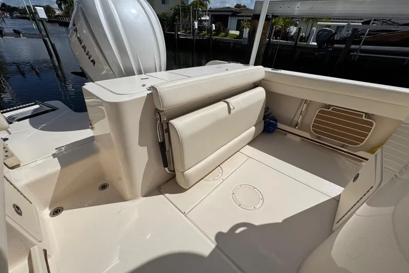  Yacht Photos Pics 2024 Grady-White Fisherman 236 boat interior with foldable seating and Yamaha engine.