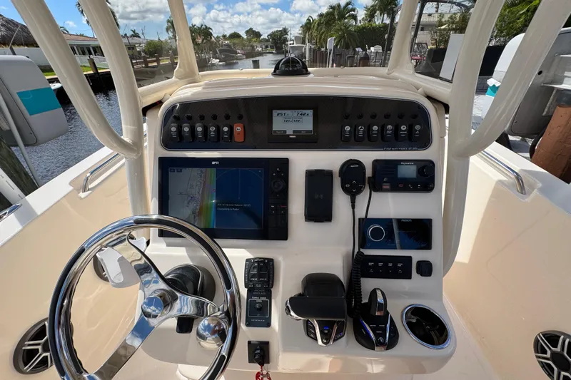  Yacht Photos Pics 2024 Grady-White Fisherman 236 helm with advanced navigation and control systems.