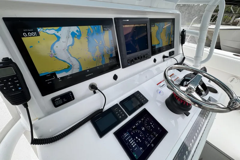  Yacht Photos Pics Cockpit of 2025 Invincible 40 Catamaran with advanced navigation displays and controls.