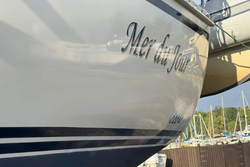 Mer Du Jour Yacht Photos Pics 2005 Caliber 40 LRC SE sailboat named "Mer du Jour" docked at marina.