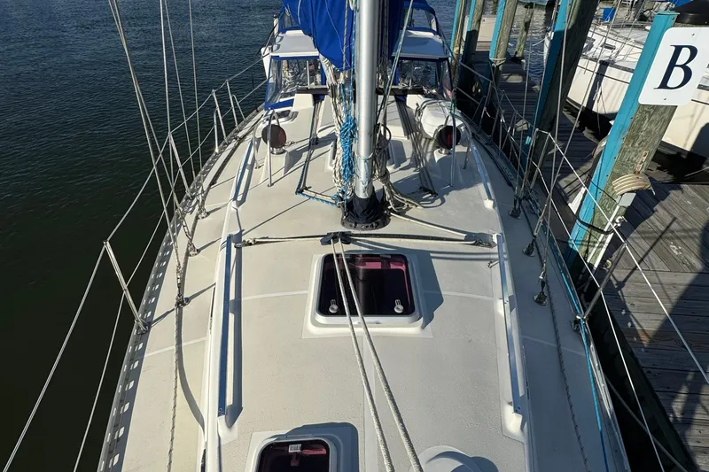 Mer Du Jour Yacht Photos Pics 2005 Caliber 40 LRC SE sailboat docked, view of deck and rigging.