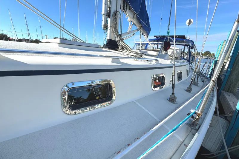 Mer Du Jour Yacht Photos Pics 2005 Caliber 40 LRC SE sailboat docked, showcasing sleek design and polished details.