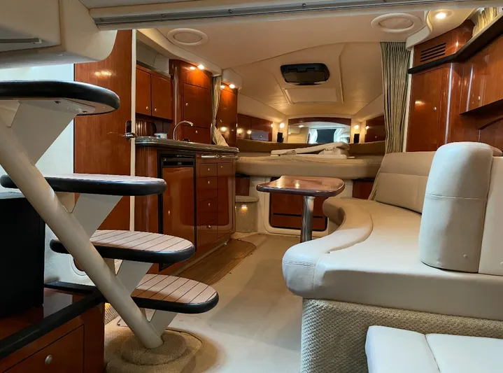  Yacht Photos Pics Luxurious interior of 2007 Sea Ray 340 Sundancer yacht with elegant wood finishes.