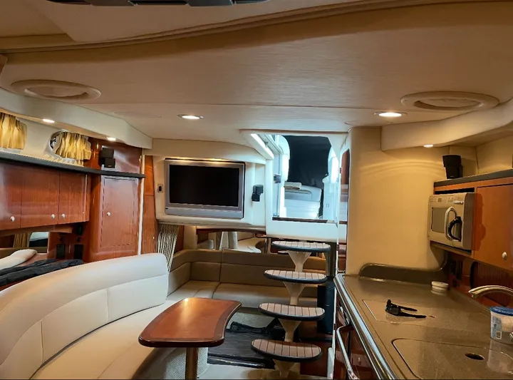  Yacht Photos Pics Luxurious interior of 2007 Sea Ray 340 Sundancer yacht with modern amenities and elegant design.