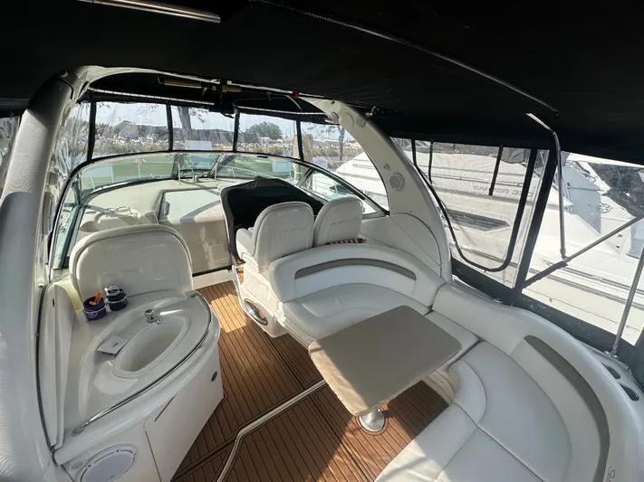  Yacht Photos Pics Interior of 2007 Sea Ray 340 Sundancer yacht with seating and table.