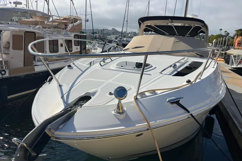 Just Plane Fun Yacht Photos Pics 2014 Sea Ray 350 Sundancer yacht docked at marina, sleek design, sunny day.