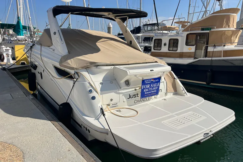 Just Plane Fun Yacht Photos Pics 2014 Sea Ray 350 Sundancer yacht docked, for sale sign displayed.