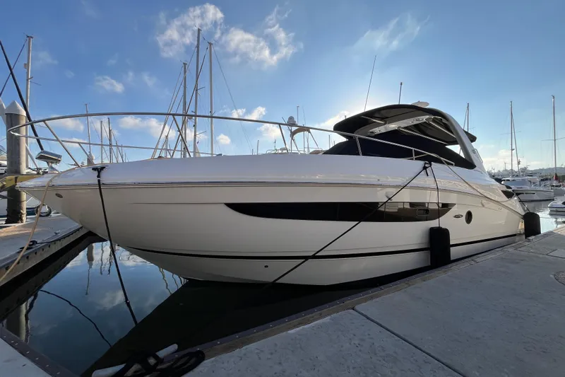 Just Plane Fun Yacht Photos Pics 2014 Sea Ray 350 Sundancer yacht docked at marina under blue sky.