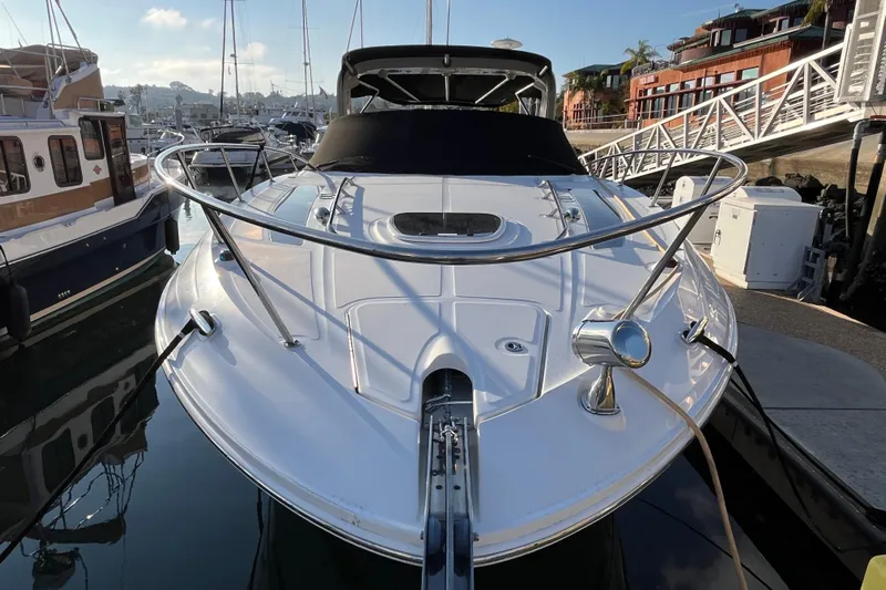 Just Plane Fun Yacht Photos Pics 2014 Sea Ray 350 Sundancer docked at marina, showcasing sleek design and modern features.