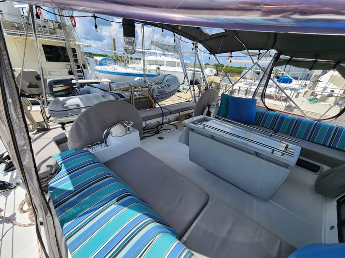Day One Yacht Photos Pics Beneteau Oceanis 45 yacht cockpit with striped cushions, 2016 model, docked at marina.