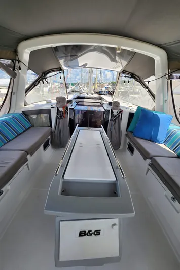 Day One Yacht Photos Pics Interior view of 2016 Beneteau Oceanis 45 sailboat with seating and B&G equipment.