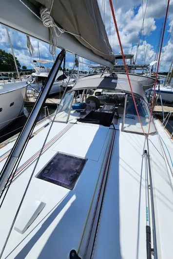 Day One Yacht Photos Pics 2016 Beneteau Oceanis 45 sailboat deck with rigging and clear sky.