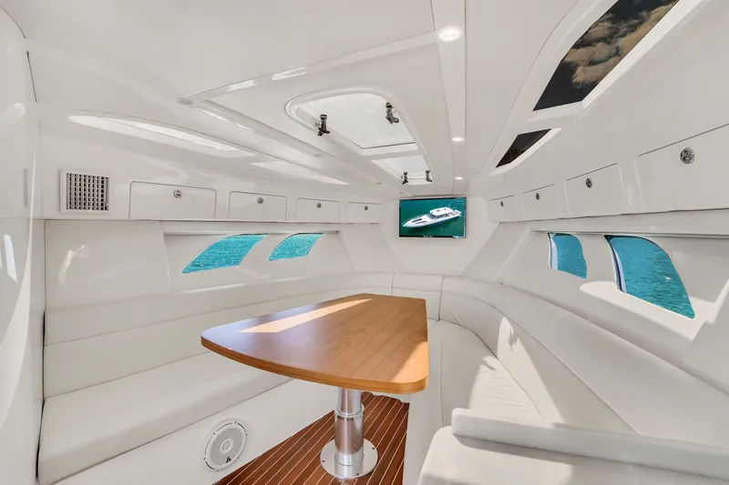  Yacht Photos Pics Luxurious interior of 2019 Intrepid 407 Cuddy boat with sleek design and modern amenities.