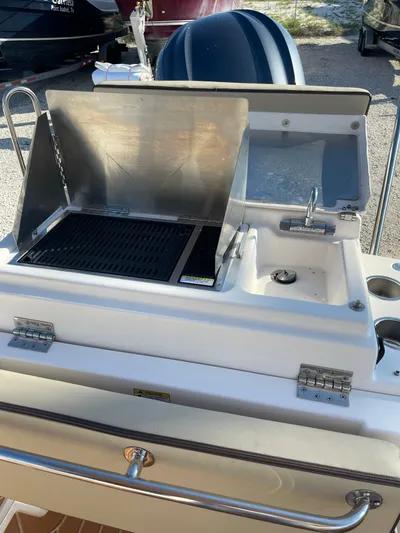  Yacht Photos Pics Outdoor grill and sink on 2023 Ranger Tugs R-27 boat deck.
