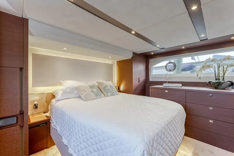 Knightlife Yacht Photos Pics Luxurious bedroom interior of 2017 Prestige 630 yacht with modern design and elegant decor.