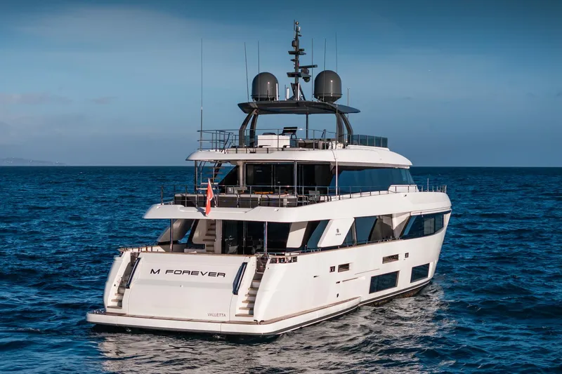 M Forever Yacht Photos Pics Luxurious 2021 Custom Line Navetta 33 yacht cruising on open sea.