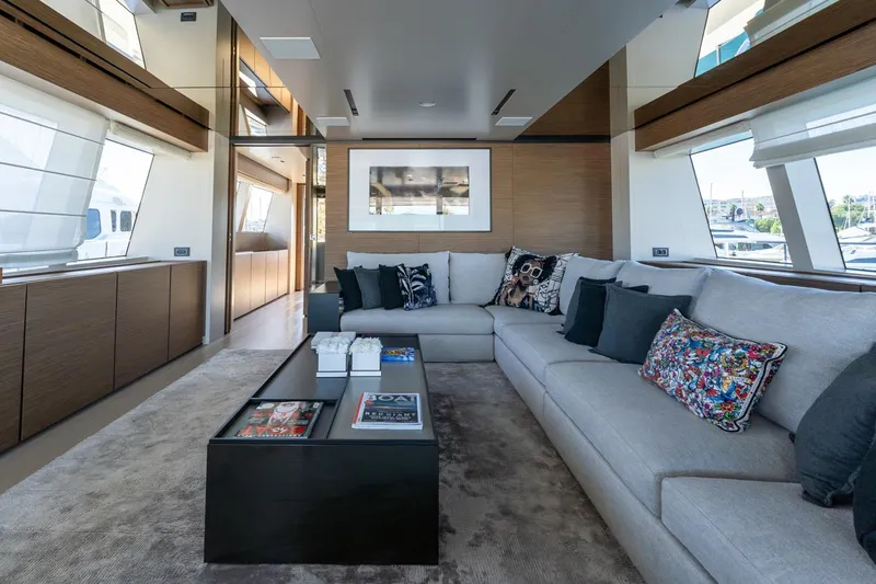 M Forever Yacht Photos Pics Luxurious interior of 2021 Custom Line Navetta 33 yacht with modern decor and plush seating.