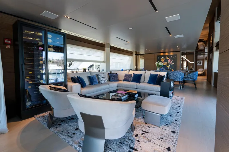 M Forever Yacht Photos Pics Luxurious interior of 2021 Custom Line Navetta 33 yacht with modern seating and decor.